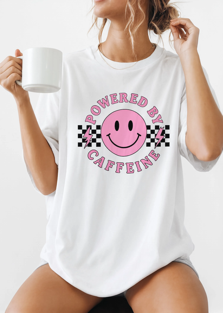 Comfort Colors Powered By Caffeine Shirt - Pink Smiley Face Retro Coffee Graphic Tee