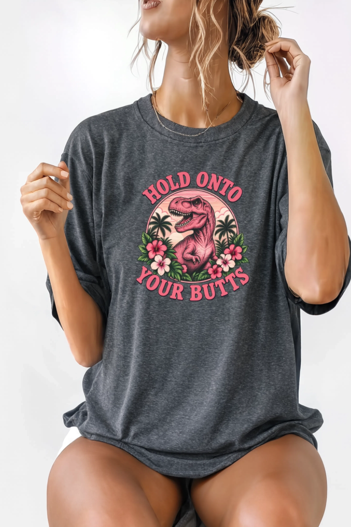 Hold Onto Your Butts Retro T-Rex Graphic Tee | Funny Dinosaur Tropical Shirt